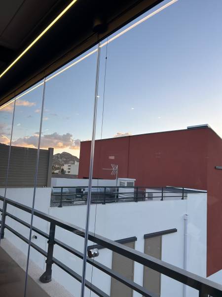 Rideaux de verre pour pergola bioclimatique 